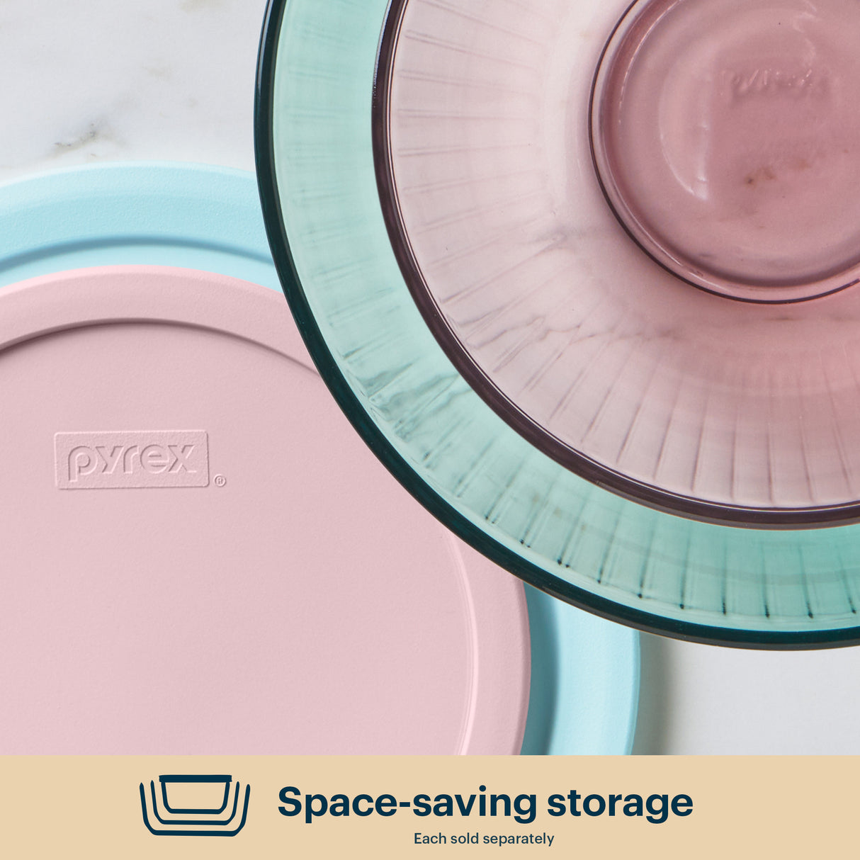 Close up of several bowls, pink and aqua bowls with lids