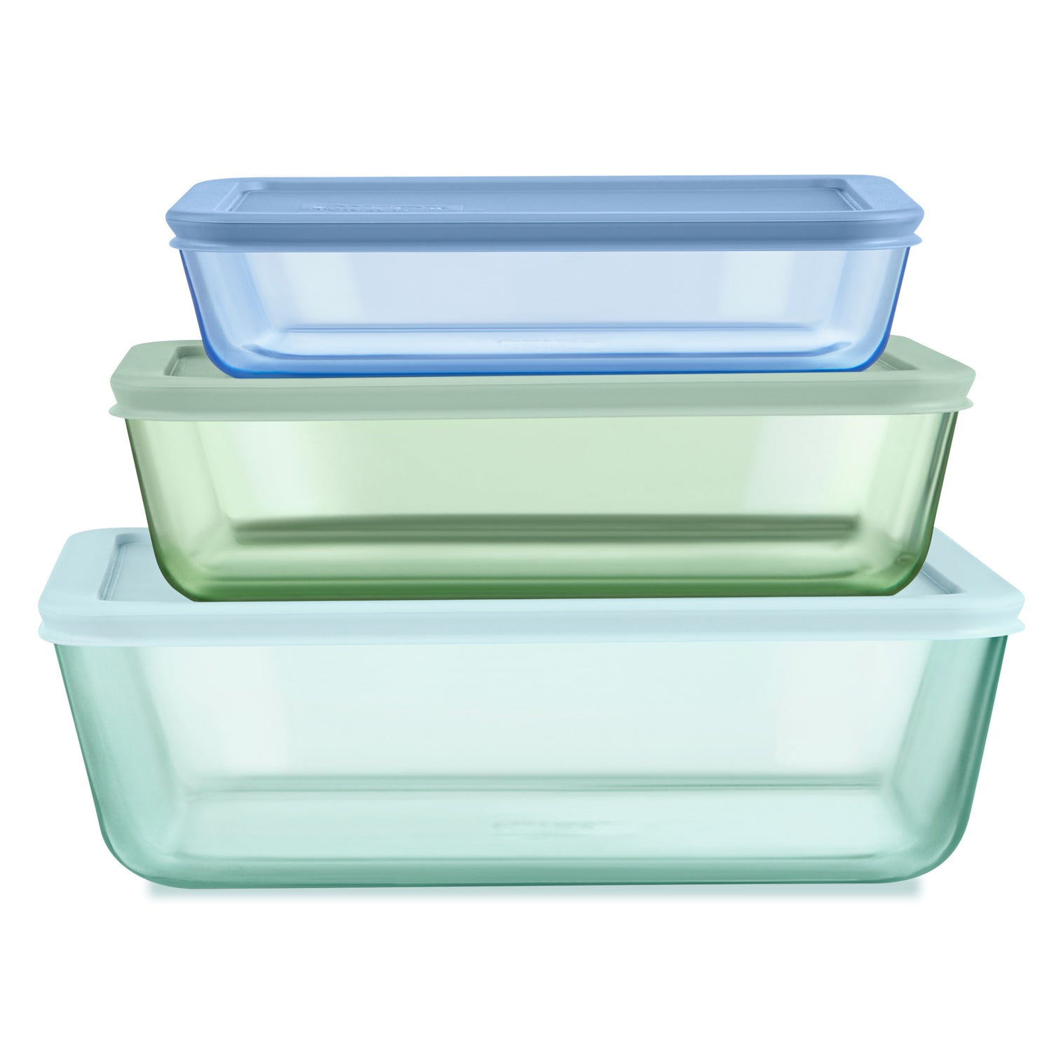 Set of three rectangular glass food containers with lids in blue, green, and clear on a white background.