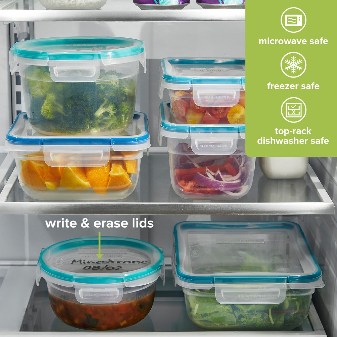 Set of food storage containers with labels inside a refrigerator, featuring microwave, freezer, and dishwasher safety icons.