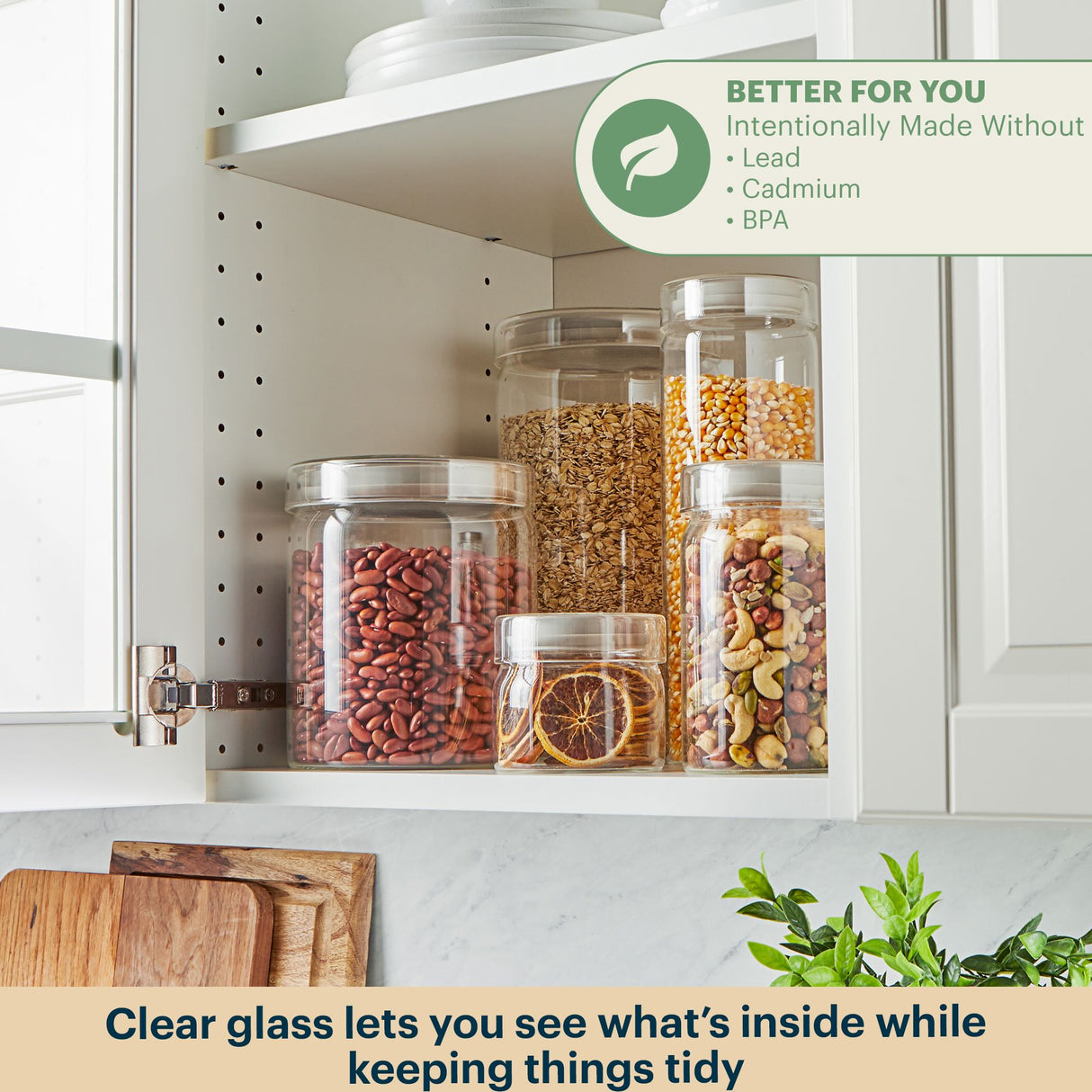 Glass jars with food storage on a kitchen shelf, labeled 'Better for You' without lead, cadmium, or BPA.