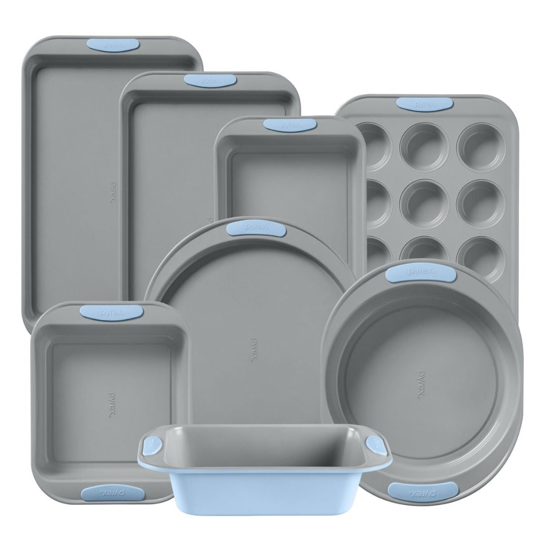 Set of gray baking trays with blue silicone grips on a white background