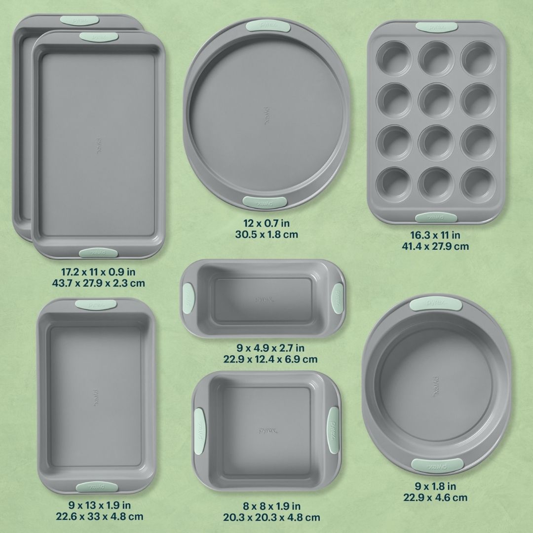 Set of gray baking molds with measurements on a green background