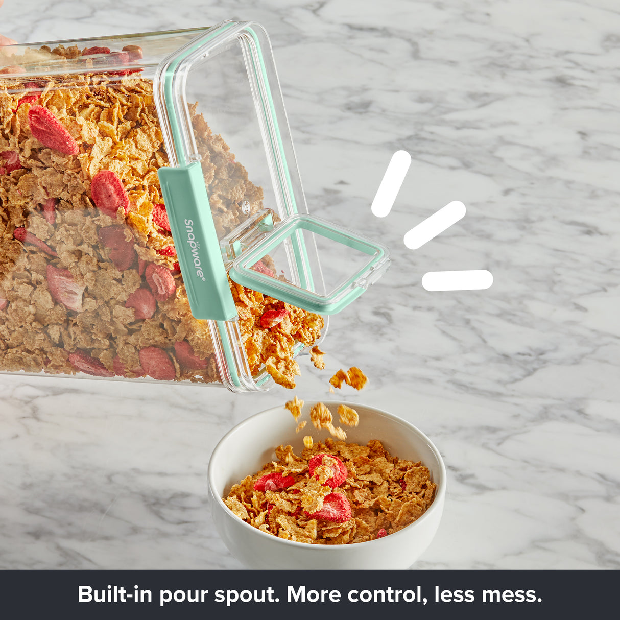 Close-up of a Snapware® food storage canister with an integrated pour spout, pouring cereal into a bowl for easy serving.